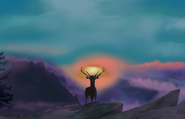 A Deer stands atop a mountain